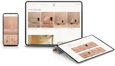 The BY G online store on an iPhone and two iPads, showing a wide-tooth comb, the full collection of kits and the pink collection of brushes and combs